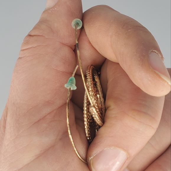 Spiral Green Goldtone Earrings and Cross Black And Green Bracelet - Picture 8 of 12